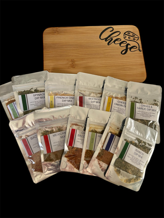 Assorted seasoning packages with a wooden board labeled 'Cheese' on a black background